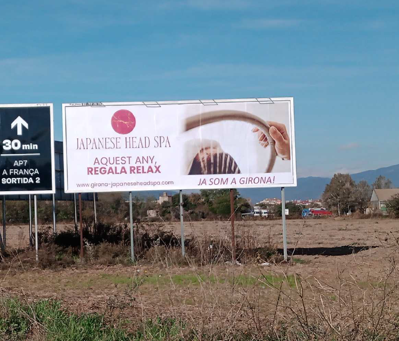 Campaña de publicidad en valla en el enlace de Salt con la C-65 y la AP-7, Salt