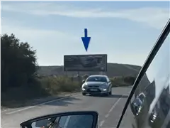 Valla publicitaria de 8 x 3 metros en la carretera del Saladar de Alicante, junto a Urbanova, orientada hacia los Arenales del Sol y Elche