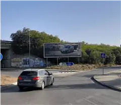 Valla publicitaria en la glorieta de la carretera del Juncal, junto a la entrada de la A-491, dirección centro comercial El Paseo, El Puerto de Santa María