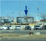 Valla publicitaria en la avenida Compositor Rafael Castro, junto al centro comercial El Arcángel y el McDonald´s, Córdoba