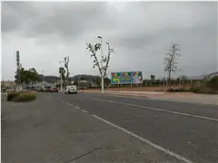 Valla publicitaria en la glorieta de la avenida de la Palmosa de Sagunto, frente al Lidl y junto a los concesionarios