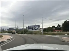 Valla publicitaria de 8 x 3 m en la glorieta de la calle de Salvador Espriu con Honorio Maura, con Yelmo Cines y Leroy Merlin al lado, Sagunto