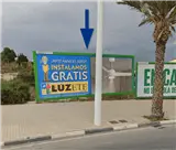 Valla publicitaria de 8 x 3 metros en el acceso a la ronda norte de Elche, junto al polígono y al polideportivo de Carrús