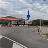 Valla publicitaria en la carretera de l’Alcora de Castellón, junto a la gasolinera, en sentido ciudad