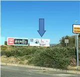 Valla publicitaria en la salida hacia Alzira y Gandía, dirección Hospital Lluís Alcanyís