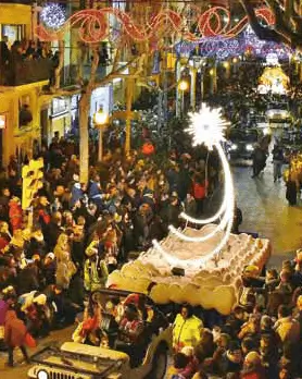Publicidad exterior en la Cabalgata de Reyes de Igualada Cabalcada de Reis con patges y escales
